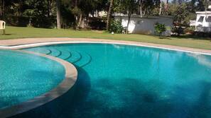 Indoor pool, outdoor pool, open 6:00 AM to 6:00 PM, pool umbrellas