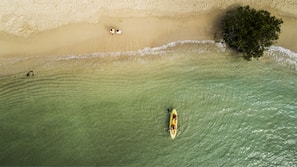 On the beach, white sand