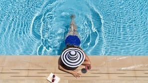 Outdoor pool, pool umbrellas, pool loungers