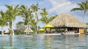 Outdoor pool, free cabanas, pool umbrellas
