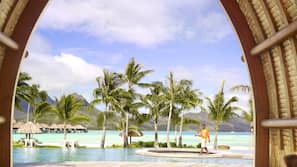 Outdoor pool, free cabanas, pool umbrellas