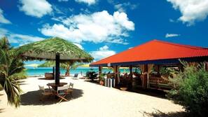On the beach, white sand, free beach cabanas, sun loungers