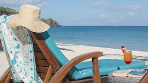 On the beach, white sand, free beach cabanas, sun loungers