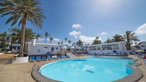 2 outdoor pools, pool umbrellas, pool loungers