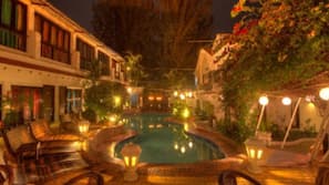 Outdoor pool, open 8:00 AM to 6:00 PM, pool umbrellas, pool loungers