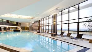 Indoor pool, seasonal outdoor pool, pool umbrellas, pool loungers