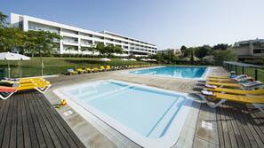 Outdoor pool, pool umbrellas, pool loungers