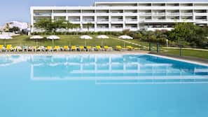 Outdoor pool, pool umbrellas, pool loungers
