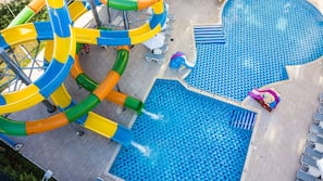 Seasonal outdoor pool, open 9:30 AM to 6:00 PM, pool umbrellas
