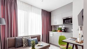 Fridge, microwave, stovetop, coffee/tea maker