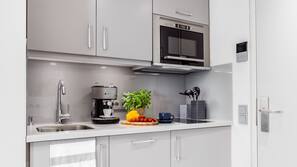 Fridge, microwave, stovetop, coffee/tea maker