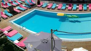 Outdoor pool, pool umbrellas, pool loungers