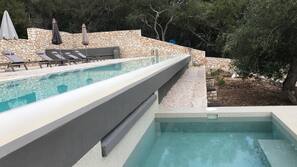 Outdoor pool, pool umbrellas, pool loungers