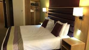 Premium bedding, blackout curtains, iron/ironing board, free WiFi