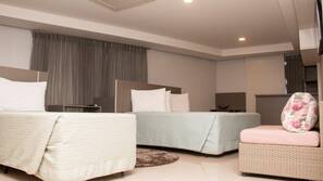 Hypo-allergenic bedding, desk, blackout drapes, soundproofing