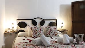 1 bedroom, premium bedding, down comforters, blackout drapes