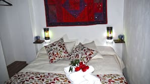 1 bedroom, premium bedding, down comforters, blackout drapes