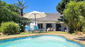 Outdoor pool, pool umbrellas, pool loungers