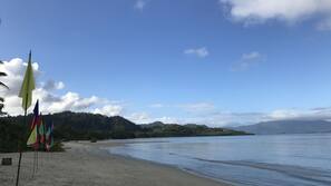 On the beach, white sand, sun-loungers, snorkelling