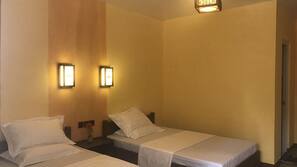 Individually decorated, desk, blackout curtains, rollaway beds