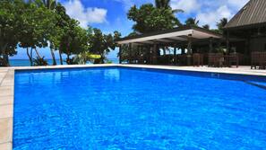 Outdoor pool, pool umbrellas, pool loungers