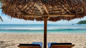 Private beach, white sand, sun-loungers, beach umbrellas