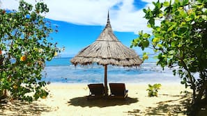 Private beach, white sand, sun-loungers, beach umbrellas