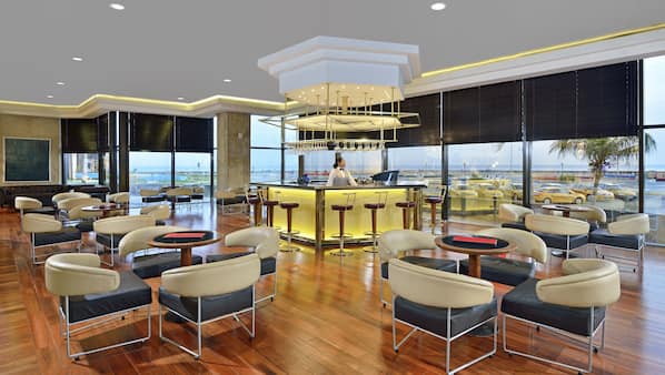 5 bars/lounges, poolside bar