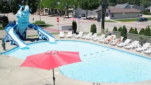 Seasonal outdoor pool, open 8:30 AM to 10:00 PM, pool umbrellas