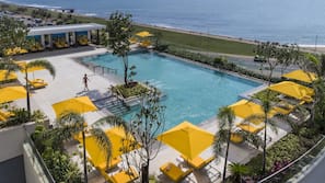 Outdoor pool, open 6 AM to 7 PM, pool umbrellas, pool loungers