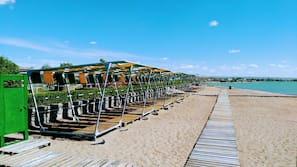 Private beach, beach umbrellas, fishing