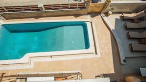 Outdoor pool, pool umbrellas, pool loungers