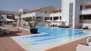Outdoor pool, pool umbrellas, pool loungers