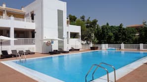 Outdoor pool, pool umbrellas, pool loungers