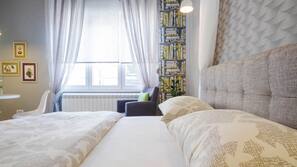 1 chambre, coffre-forts dans les chambres, fer et planche à repasser