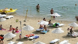 Beach nearby, sun-loungers, beach umbrellas