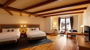 Premium bedding, down comforters, pillowtop beds, minibar