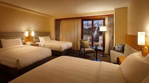 Premium bedding, down comforters, pillowtop beds, minibar