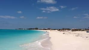Beach nearby, white sand, sun loungers, beach umbrellas