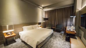 Premium bedding, down comforters, pillowtop beds, minibar