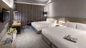 Premium bedding, down comforters, pillowtop beds, minibar