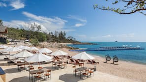 Private beach, white sand, beach umbrellas, beach towels