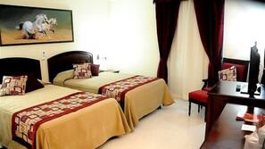 Minibar, desk, linens