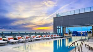 Outdoor pool, open 6 AM to 10:00 PM, sun loungers