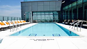 Outdoor pool, open 6 AM to 10:00 PM, sun loungers