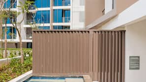 2 outdoor pools, open 7 AM to 7 PM, pool umbrellas, pool loungers