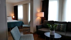 Minibar, desk, blackout curtains, iron/ironing board