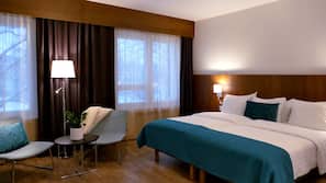 Minibar, desk, blackout curtains, iron/ironing board