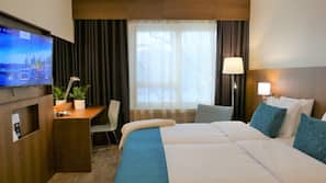 Minibar, desk, blackout curtains, iron/ironing board
