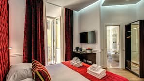 Ropa de cama de alta calidad, edredones de plumas, minibar y caja fuerte